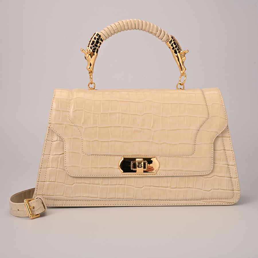 CARTERA BEIGE CON TEXTURA Y ACCESORIO